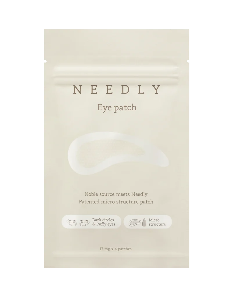 Pakiranje proizvoda Needly Eye Patch, dio Divote Cosmetics asortimana s korejskom kozmetikom, dizajnirano za smanjenje podočnjaka i umora oko očiju, s patentiranom mikrostrukturom za optimalnu njegu.