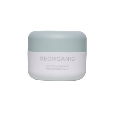 Staklenka s natpisom "GEORGANIC Centella Ceramide Moisturizing Balm", povezana s divote cosmetics i Korean cosmetics industrijom.