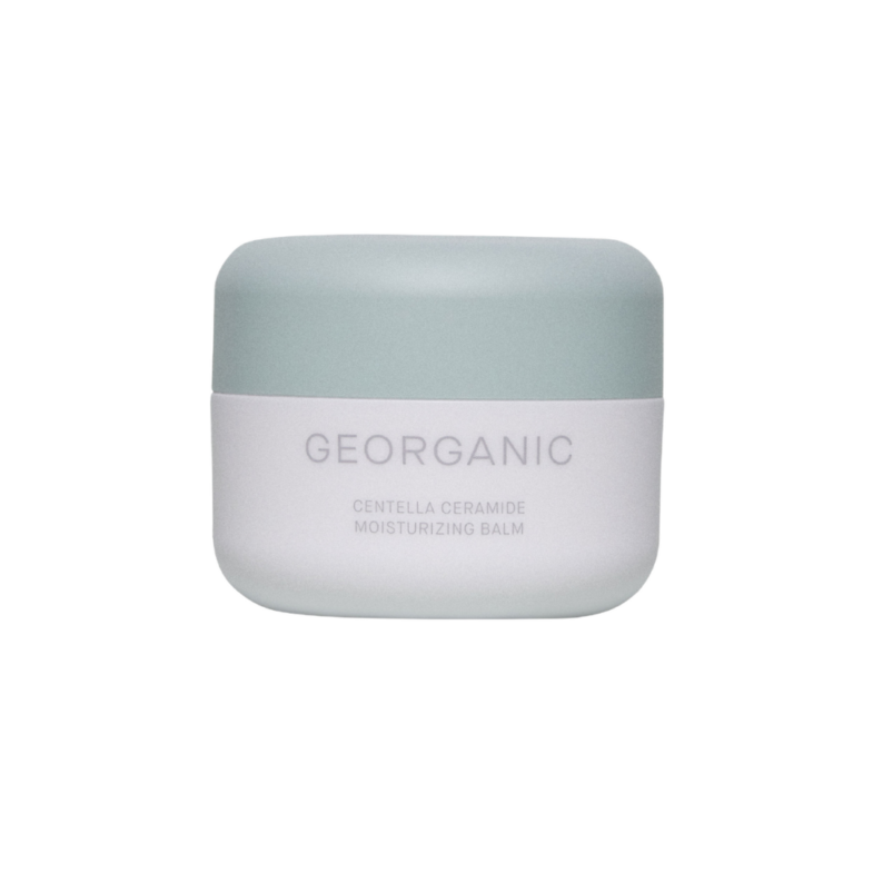 Georganic krema u bijeloj i zelenoj posudi povezanu s "Divote Cosmetics" i "korejskom kozmetikom".