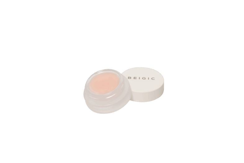 Bežičan proizvod korejske kozmetike Beigic u maloj bijeloj posudi otvorenoj pored poklopca, povezan s izrazom 'divote cosmetics'.